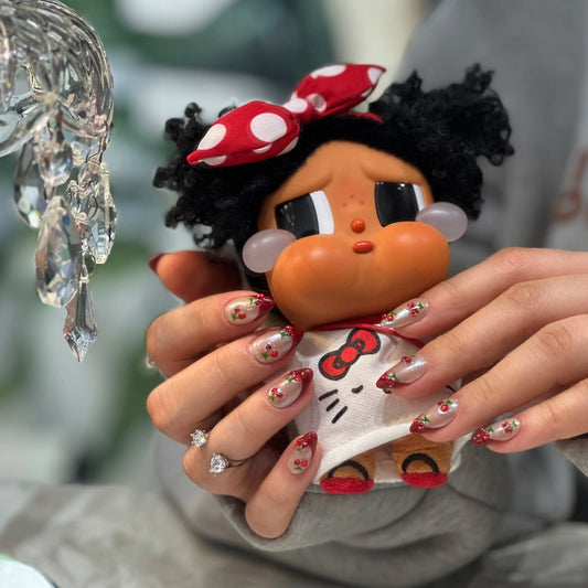 Close-up of the rich, velvety crimson finish on the French tips.