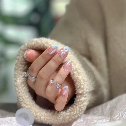 Side view of the serene blue to white ombre effect on the ocean-inspired nails.