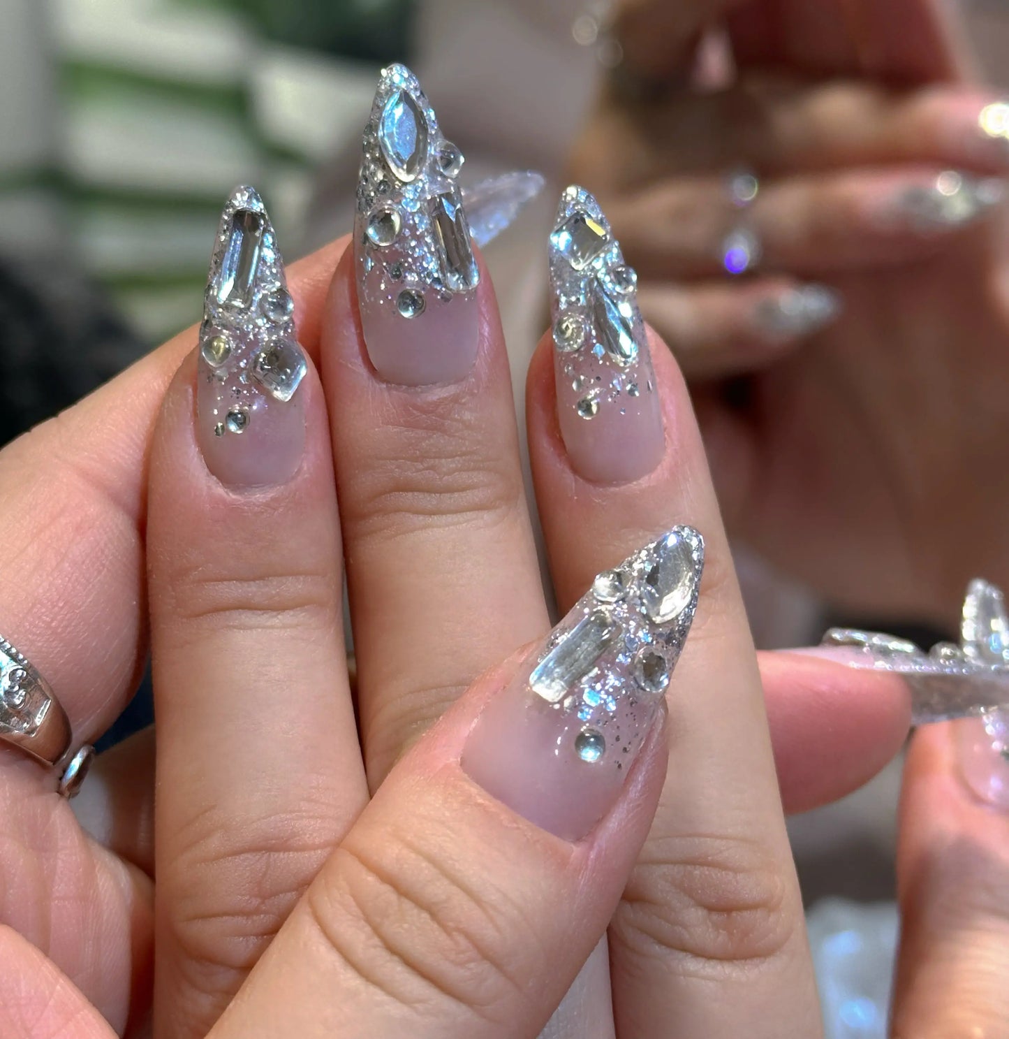 Dazzling winter manicure with Frost Crown icy star press on nails.

