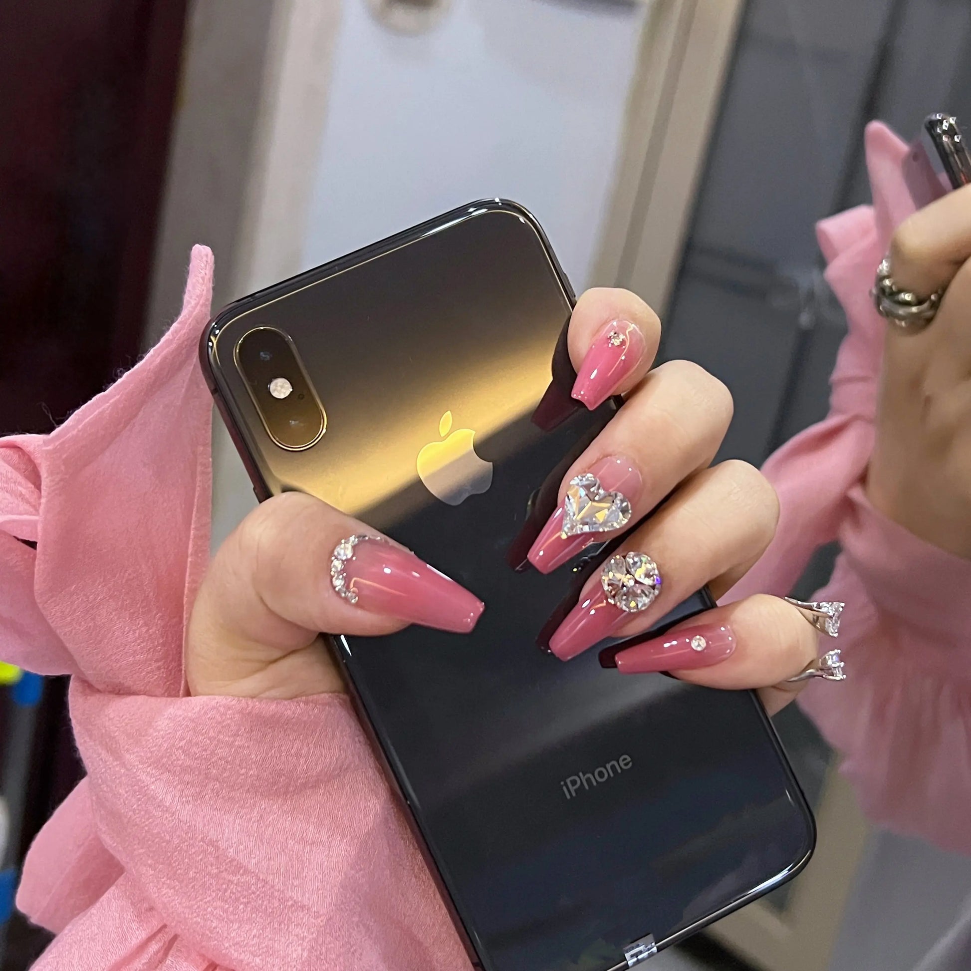 Elegant and luxurious manicure with Rose Crown crystal press on nails for special events.

