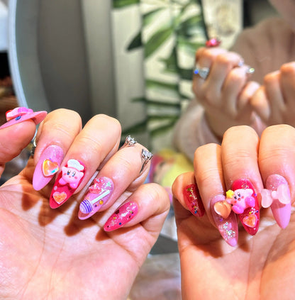 Vibrant colors and glossy finish on the Kirby Dreams nail set.

