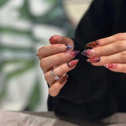 Hand-sculpted floral artwork detail on the Dark Bloom press on nails.