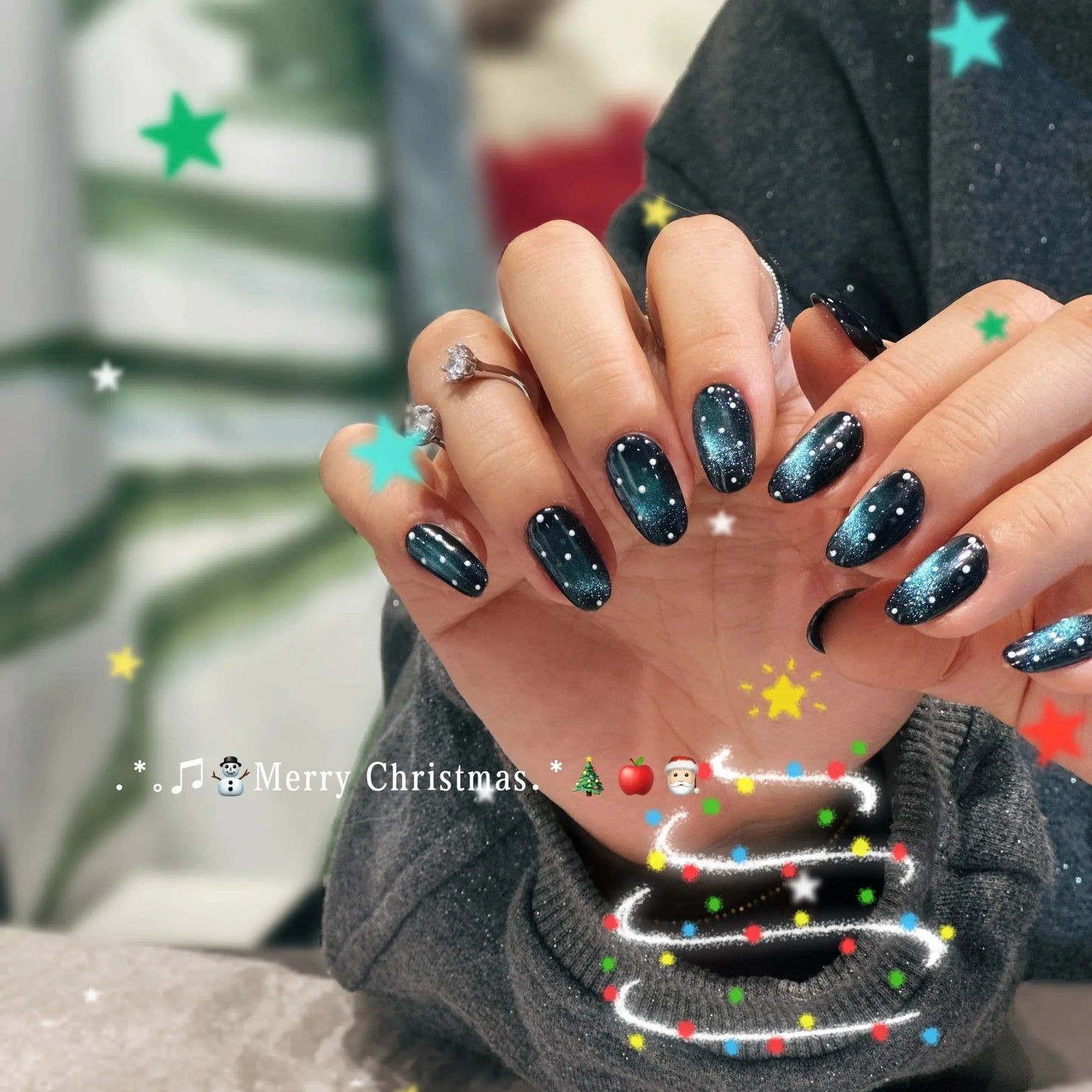 Close-up of the nebula-green ombre effect on the dark cosmic nails.

