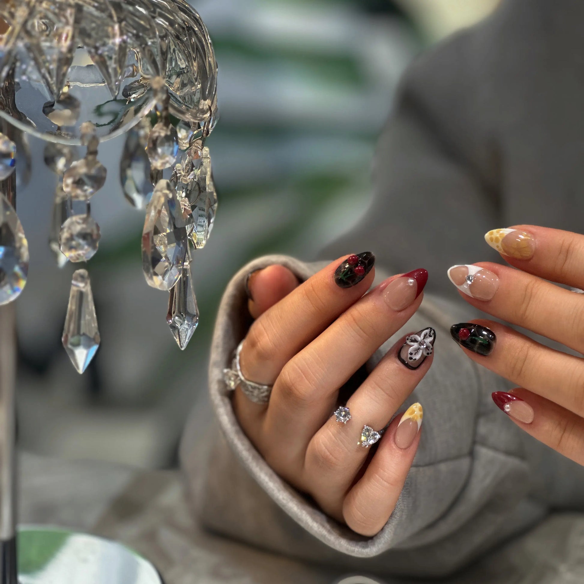 Regal winter manicure with Berry Crown calligraphy press on nails.

