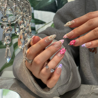 Close-up of the delicate seashell stripes on the Ocean Petal nails.

