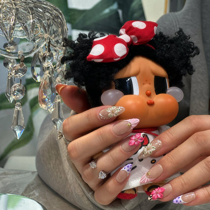 Warm mocha-nude base color and glossy finish of the Ocean Petal nails.

