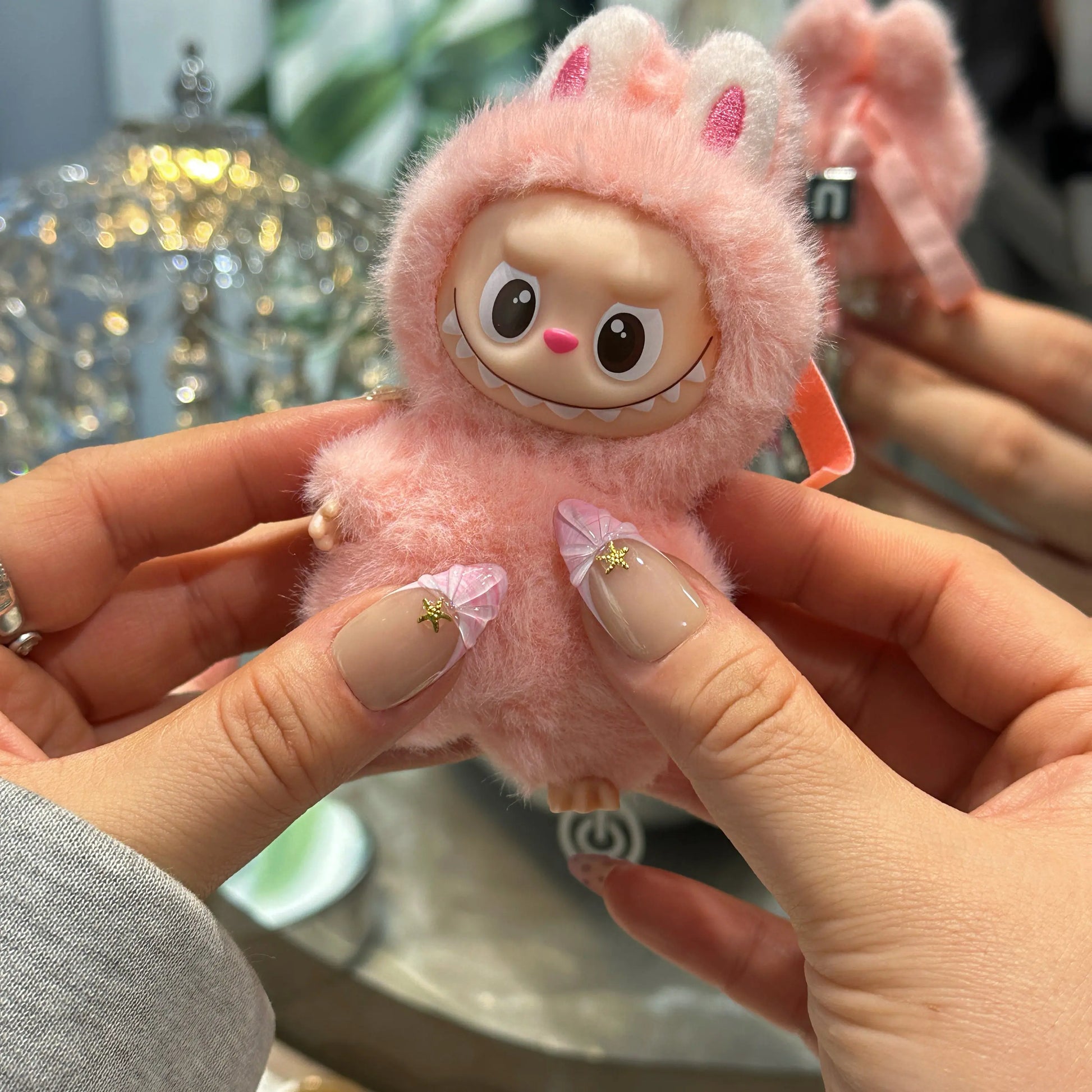 Serene beach vibe manicure with Ocean Petal seashell press on nails.

