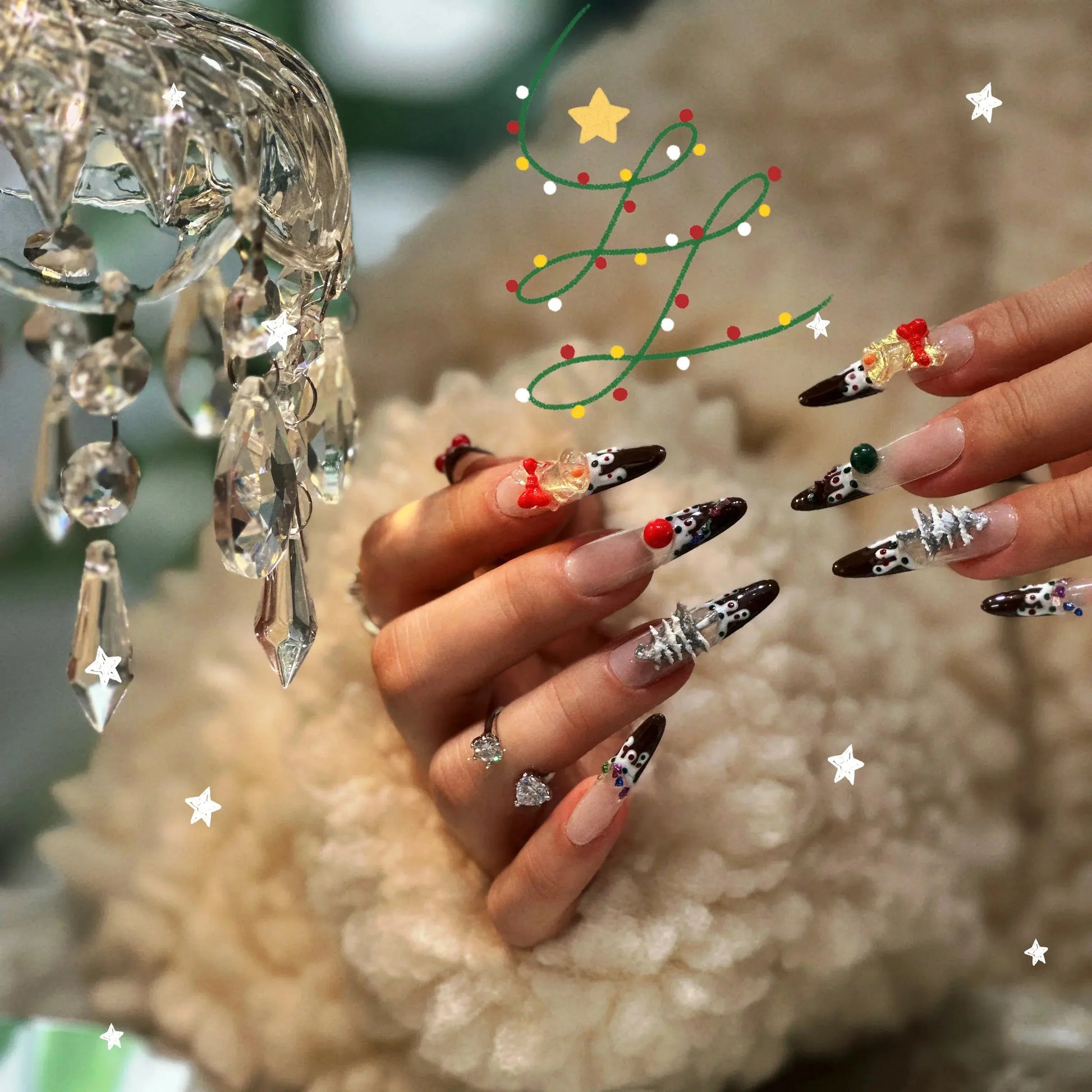 Close-up of the charming 3D holiday icon details on the winter-themed nails.


