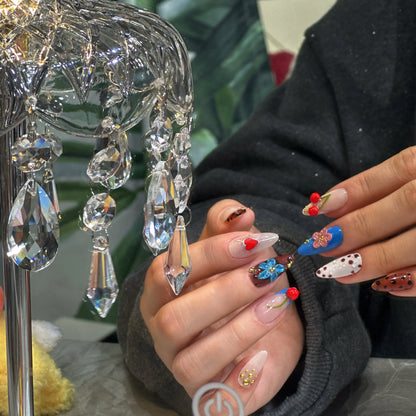 Enchanting winter manicure with Enchanted Berry snowflake press on nails.


