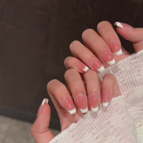 Everyday elegant manicure with Nude Glow French tip press on nails.

